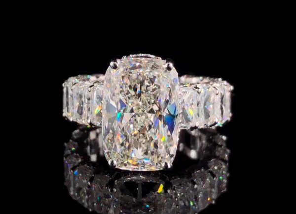 8.5 carat Elongated Cushion cut Diamond Ring with Radiant cut Side Stones
