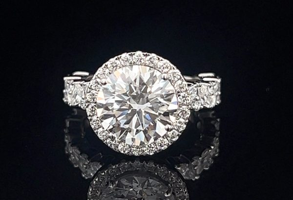 4.75 ROUND BRILLIANT DIAMOND RING WITH MARQUISE & ROUND BAND